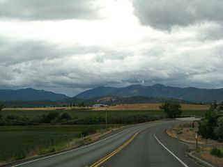 California 3 (Montague Road) reaches the floor of the Shasta Valley as it approaches the Shasta River crossing.