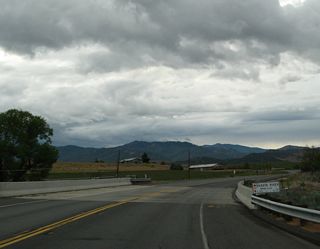 Westbound California 3 (Montague Road) crosses over the Shasta River, then proceeds west toward Yreka and the Siskiyou Mountains.