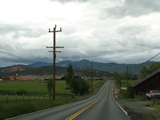 After Collier Lane, westbound California 3 (Montague Road) proceeds through agricultural land en route to Yreka.