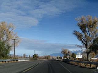 U.S. 6 crosses over the North Fork of Bishop Creek. The creek flows toward the Owens River, which in turn flows south toward Owens Lake.
