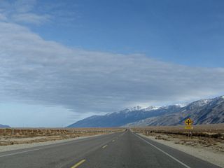 Northbound (eastbound) U.S. 6 approaches Rudolph Road.