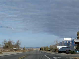 Motorist services (gas, food) are available in Chalfant at the intersection with Brown Subdivision Road. Ahead, U.S. 6 resumes its northerly course through Chalfant Valley.
