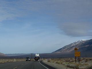 Northbound (eastbound) U.S. 6 approaches White Mountain Ranch Road (east to White Mountain Ranch and Millner Falls Creek) and Chicago Canyon Road (northwest to the Red Canyon Petroglyphs). After this area, U.S. 6 leaves Chalfant Valley and enters Hammil Valley.