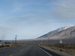 A U.S. 6 reassurance marker precedes Dawson Ranch Road. This sign was posted with a north cardinal direction banner in the 1990s. Continuing northward, U.S. 6 enters the unincorporated community of Hammil. Some agriculture is practiced in Hammil, and an old alignment of U.S. 6 (Hammil Road) can be accessed via Crestview Drive.