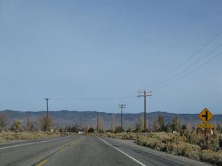 U.S. 6 (Grand Army of the Republic Highway) eastbound approaches Walker Place and nears the unincorporated community of Benton.
