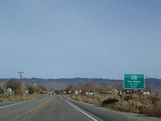 U.S. 6 enters the unincorporated community of Benton (el. 5,377 feet, population 164 per the Caltrans entry sign), which was founded primarily due to its location near Benton Hot Springs. The area was settled in the 1850s as part of the mining boom of that era (with the ghost town of Bodie an example of mining towns from that era). In downtown Benton, U.S. 6 meets California 120, which travels west to Black Lake, Adobe Valley, Sagehen Summit (el. 8,139 feet), Mono Valley, the South Tufa formations along Mono Lake, and Lee Vining. During winter, California 120 over the Sagehen Summit is closed. West of U.S. 395 at Lee Vining, California 120 ascends to Tioga Pass (also closed in winter) and enters Yosemite National Park before passing through Gold Country and entering the Central Valley. The state route ends at Interstate 5 in Lathrop near Manteca.