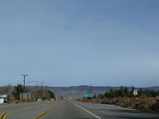 A U.S. 6 east reassurance shield is posted along the Grand Army of the Republic Highway in Benton after the California 120 junction. From here, U.S. 6 will bend northeast through the Benton Valley toward the California-Nevada state line.