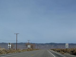 U.S. 6 resumes its two-lane "freeway" configuration, with limited access points onto the two-lane rural highway. The speed limit rises to 65 miles per hour.