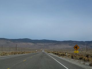 In quick succession, eastbound U.S. 6 approaches Sipes Ranch Road, Pedro Ranch Road, and Bramlett Ranch Road.