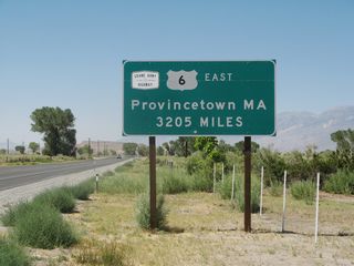 This U.S. 6 mileage sign is posted in Bishop as U.S. 6 begins its journey east across the country. Between Bishop and Benton, U.S. 6 was signed north-south until around 2005, when signs were changed to match the general direction of the route east to Massachusetts. Nevertheless, U.S. 6 travels almost due north-south while in California. From Bishop, it is a long way to Provincetown, Massachusetts!