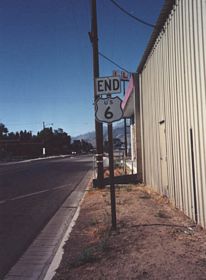 This U.S. 6 end shield assembly is posted in downtown Bishop as U.S. 6 east (south) approaches U.S. 395 (after the Wye Road intersection). The route marker and end shields were replaced between 1998 and 2007; you can see the inverted location of the end plate. When we visited this area again in September 2009, the entire end shield assembly was gone, with evidence it had been knocked down.