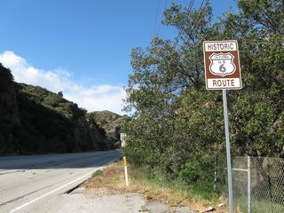 A Historic U.S. 6 shield is posted just north of the city limits sign in Santa Clarita near an abandoned rest area on the east side of Sierra Highway. These historic route marker signs were largely placed in 2009. Ahead, Sierra Highway (old U.S. 6) parallels California 14 en route to its junction with Newhall Avenue, where the state resumes maintenance of the route as part of California 14U.