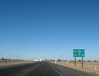 Another mileage sign for California 98 (0.25 mile) and Interstate 8 (5.75 miles) is posted after the Maggio Road intersection. The traffic signal for California 98 comes into view in the distance.