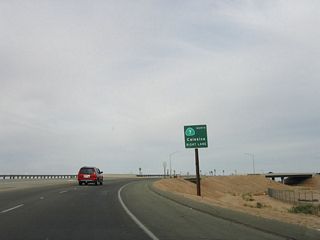 Another reassurance sign for California 7 is posted after the Menvielle Road intersection. In the distance, the interchange with Nina Lee Road comes into view.