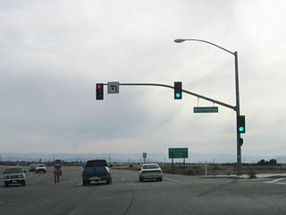 The intersection with Menvielle Road is the final traffic signal along southbound California 7. After passing the Carr Road intersection, Menvielle Road travels north to California 98 on an alignment parallel to California 7.