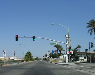 Fred Waring Way connects Indio Boulevard with Monroe Street at the south end of the elevated roadway.