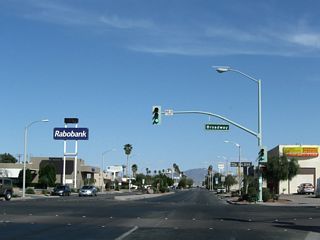 The succeeding traffic light on Business Loop I-10 (Hobson Way) east is with Broadway.