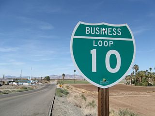 Business Loop I-10 extends 0.21 miles north along Neighbors Boulevard from the diamond interchange joining I-10 with east end of SR 78 in western Blythe.