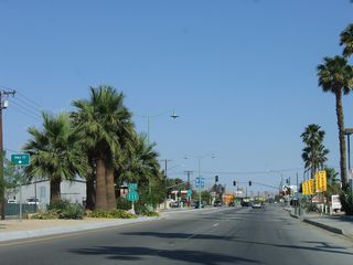 Highway 111 converges with Indio Boulevard at the succeeding traffic light beyond Golf Center Parkway. Shields for SR 111 were removed along Indio Boulevard by 2008 and the arterial route rebranded by the city of Indio as simply "Highway 111".