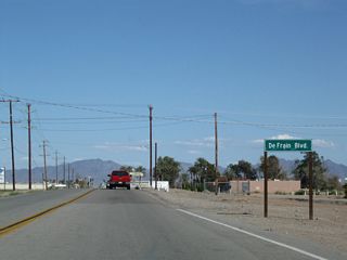 C-05 Canal parallels Business Loop I-10 (Hobson Way) east to DeFrain Boulevard.