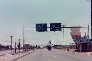 Prior to the construction of the Dillon Road Grade Separation, Business Loop I-10 turned northeast from SR 111 (Indio Boulevard) onto Dillon Road directly. This connection was removed when Dillon Road was realigned across Indio Boulevard west to Avenue 48.