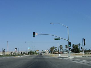 Business Loop I-10 (Indio Boulevard) east meets Hoover Street, which becomes Hoover Avenue east beyond Fred Waring Drive.