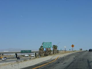 2015-17 construction replaced the modified diamond interchange (Exit 139) joining I-10 with Indio Boulevard. Indio Boulevard commenced east from Exit 139 in the old configuration. The new parclo interchange connects with Jefferson Street, which was extended south over Indio Boulevard.