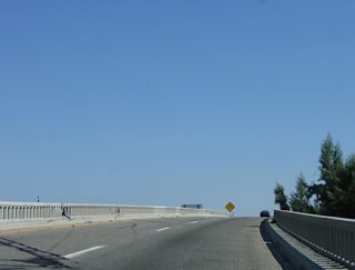 The original southbound bridge taking Business Loop I-10 (Indio Boulevard) across the Union Pacific Railroad was built in 1956 while the companion northbound span dated from 1936.