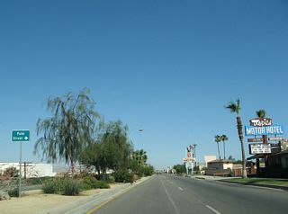 Business Loop I-10 and Historic U.S. 60-70-99 east at Palm Street. The business route designation was deemphasized starting in 2007. This coincided with the relinquishment of SR 86 and SR 111 within city limits to the city of Indio.
