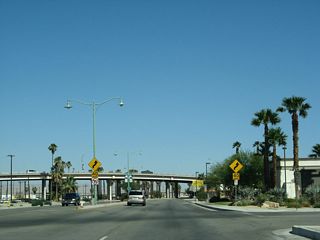 Business Loop I-10 intersects Smurr Street and Fargo Street ahead of The Jackson Street viaduct spanning Indio Boulevard and the Union Pacific Railroad.