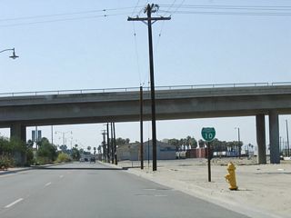 The Business Loop I-10 confirming marker posted along Indio Boulevard westbound between Highway 111 and Golf Center Parkway was removed by 2012. Following the decommissioning of U.S. 60 in 1964, Indio Boulevard was part of SR 86. SR 86 was truncated south to SR 111 by the late 1990s.