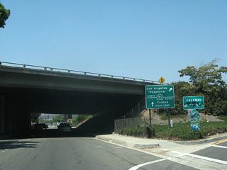Fairplex Drive south intersects Business Loop I-10 across from ramps with SR 71 (Chino Valley Freeway) northbound. Left turns are restricted here, as Holt Avenue has a dedicated entrance ramp for SR 71 north.