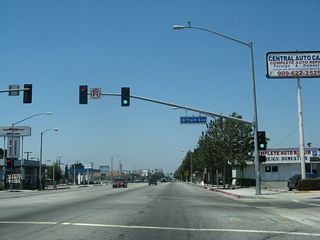 Westbound Business Loop I-10 (Holt Avenue) meets Clark Avenue at this traffic signal.