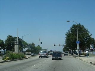 Holt Avenue continues west into the Pomona business district.