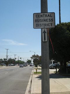 Replaced by 2011 and subsequently removed due to road construction in 2021, a "Central Business District" sign preceded Mountain Avenue along Holt Boulevard eastbound. Mountain Avenue crosses over the Union Pacific Railroad and State Street south of Brooks Street on a viaduct.