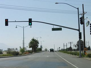 Indio Boulevard next meets Clinton Street at this traffic signal.