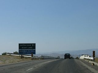 The northern section of Jefferson Street previously ties into Varner Road, a north side freeway frontage road to I-10 at Exit 139.