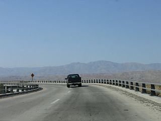 Business Loop I-10 (Indio Boulevard) westbound crossed Interstate 10 on this two-lane bridge. This exchange was formerly the north end of SR 86.