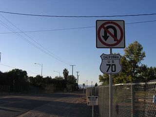 A historic U.S. 70 shield was temporarily posted along Riviera Drive at Quechan Park adjacent to the Colorado River bridge along Interstate 10. Business Loop I-10 begins 0.9 miles to the west via Connector Road north to Hobson Way.