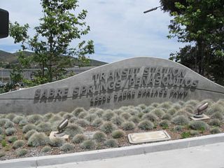 A major transit station, the Sabre Springs - Pe&ntilde;asquitos Transit Center, is located near the southeast corner of the I-15/SR 56 interchange in Sabre Springs.