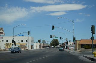 Old U.S. 91 turns north from Business Loop I-15/Historic U.S. 66 (Main Street) at First Avenue. First Avenue leads old U.S. 91 north past B Hill onto a viaduct spanning the BNSF Railyard. 1st Avenue turns northeast from the Western America Railroad Museum across the Mojave River to former U.S. 466 (Old Highway 58) in north Barstow.