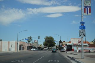 County Route 66 posted along eastbound Main Street between First Avenue and Second Avenue.