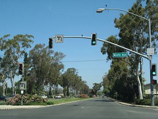 Ninth Avenue heads east from the signalized interection with Business Loop I-15 (Centre City Parkway) to Chestnut Street.