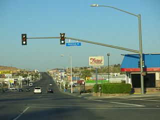 An array of traveler services line Main Street east across the west side of Barstow. Avenue H intersects Historic U.S. 66 south from the BNSF Barstow Railyard.