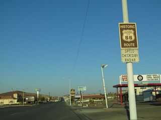 A Historic U.S. 66 shield precedes the intersection with Avenue J south along northbound Business Loop I-15 (Main Street). U.S. 91 is not signed as a historic route in California.