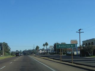 The next intersection along Business Loop I-15 (Centre City Parkway) north is with Brotherton Road.