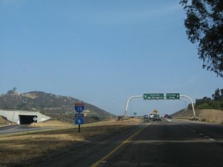 A tunnel connects from Interstate 15 south to Business Loop I-15 (Centre City Parkway).