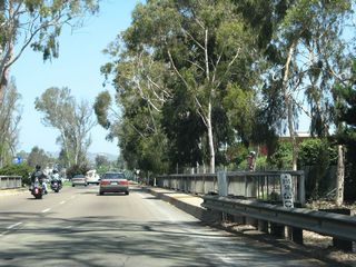 A pair of older bridges carries Business Loop I-15 over channelized Escondido Creek. Taken down by 2017, a relic of its former role as U.S. 395 was a Route 395 postmile that remained after Centre City Parkway was decommissioned as a state route and turned over to the city of Escondido.