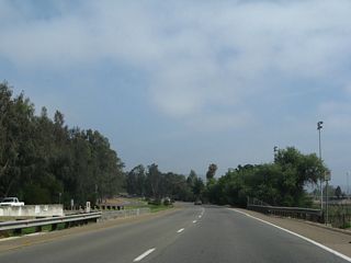 Business Loop I-15 (Centre City Parkway) continues north uninterrupted for 0.8 miles from El Norte Parkway to Iris Lane.