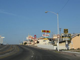 Passing south of B Hill, Historic U.S. 66 (Main Street) shifts southward ahead of Otis Avenue.T
